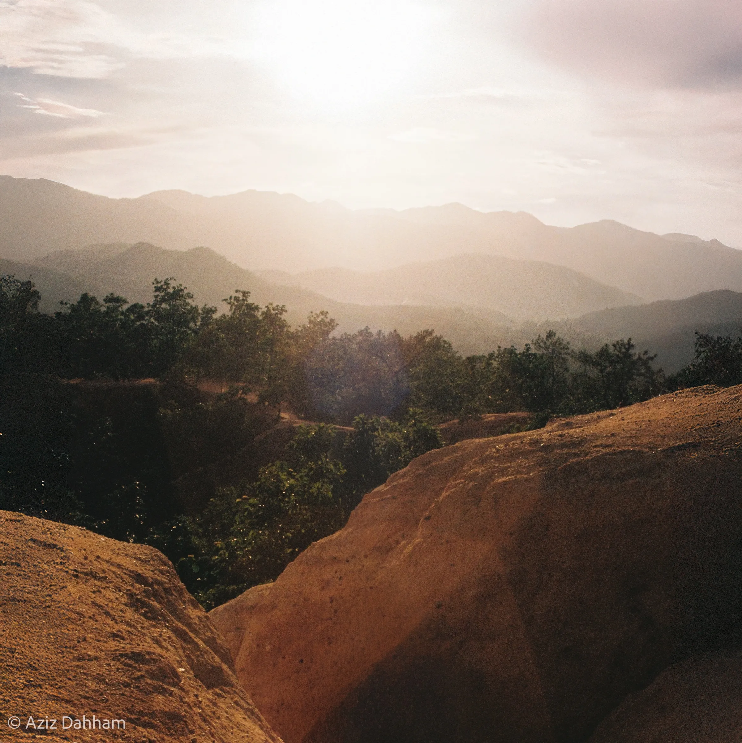 Sandstone ridges into the sun, northern Thailand