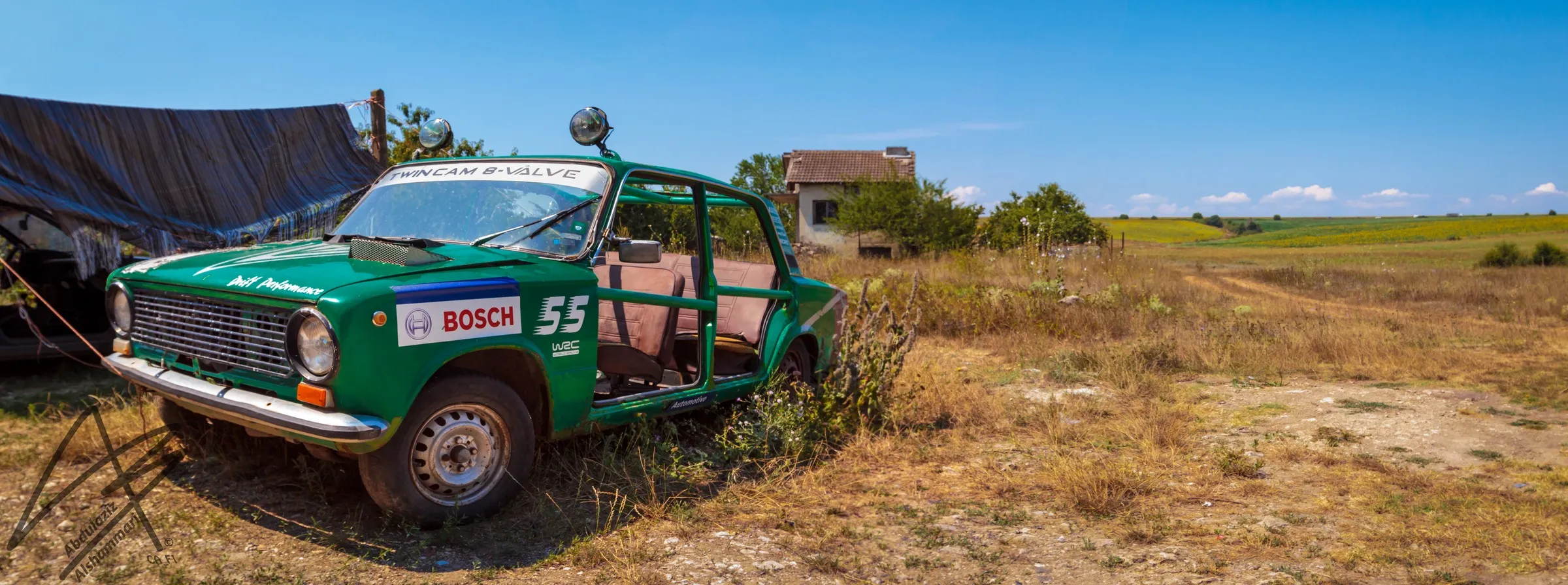 Retired rally car in a field
